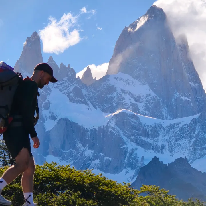 Alejandro Fontal hiking in front of a mountain